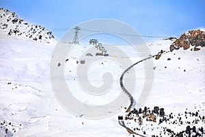 Town of Sankt Moritz luxury winter ski slope and cogwheel track view photo