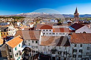 Town of Sinj in Dalmatia hinterland aerial view, southern Croatia. Panoramic view of small picturesque town Sinj in Croatia,