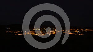 Night panoramic image of the town, El Granado, Huelva, Andalusia, Spain. photo