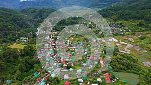 The town is surrounded by mountains, a top view. Sagada city on Luzon island, Philippines.