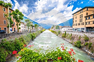 Town of Tirano and Adda river waterfront view