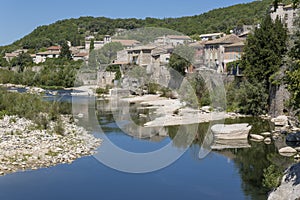 The town of Vogue, France, situated at the Ardeche river photo