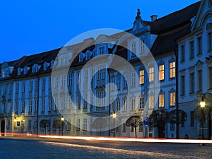 Moving traffic in old town by twilight