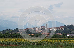 Townscape of San Daniele del Friuli, a town known for the prosciutto which bears its name. Cloudy sky photo