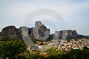 Townscape view of Kalambaka ancient town with beautiful rock formation mountain, immense natural boulders pillars and sky