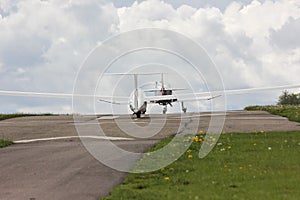 towplane with glider starting