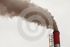Toxic and polluting smoke being expelled by a factory