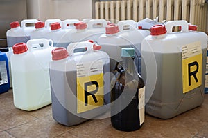 Toxic waste in jerry cans in the chemistry laboratory