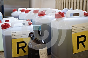 Toxic waste in jerry cans in the chemistry laboratory.