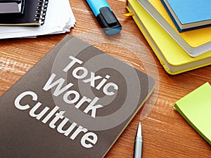 Toxic Work Culture is shown on the business photo