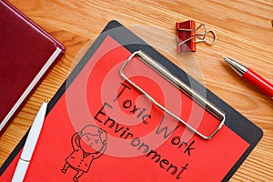 Toxic Work Environment is shown on the business photo using the text