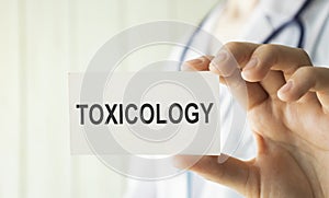 Toxicology on the Document with yellow photo
