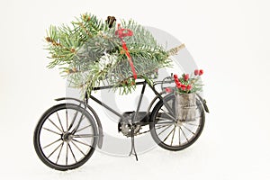 Toy bicycle with christmas decorations