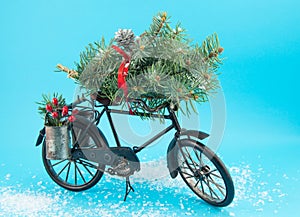 Toy bicycle with christmas decorations