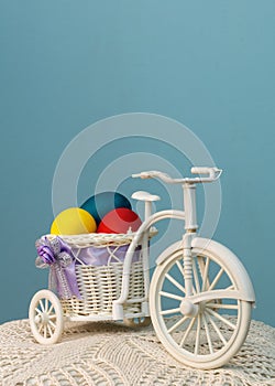 Toy bike with colored eggs