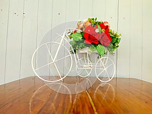 Toy bike decorated with flowers