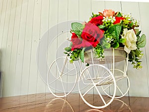 Toy bike decorated with flowers