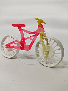 toy bike standing on white background isolate best quality