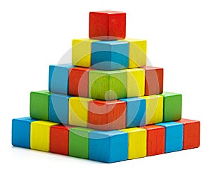 Toy blocks pyramid, multicolor wooden bricks stack