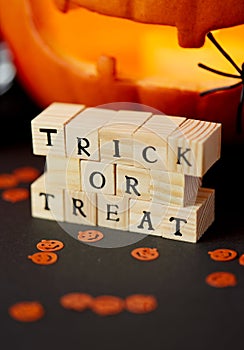 Toy blocks with trick or treat words on halloween