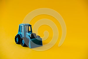 Toy blue agricultural tractor