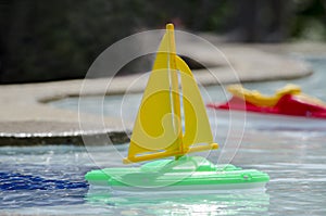 toy boats in a pool