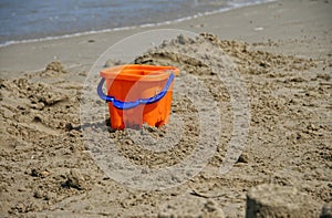 Toy Bucket on Sand