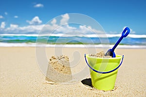 Toy bucket and shovel on the beach