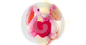 Toy bunny with a heart.  Preparation for a romantic holiday at home. Valentines Day, Birthday  and love Concept