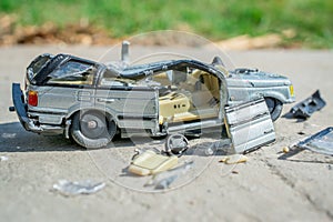 Toy Car broken into pieces, weeks broken glass