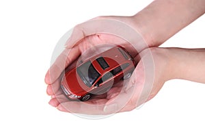 Toy car in female hands