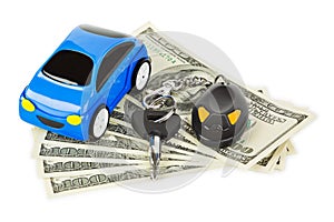 Toy car, keys and money