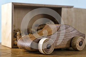 Toy car made of oak wood