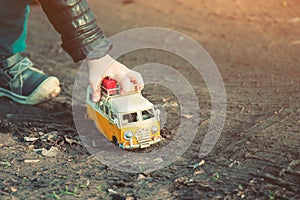 Toy car model of the car stuck in the mud