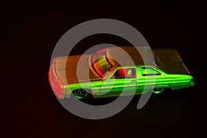 Toy car under red and green light