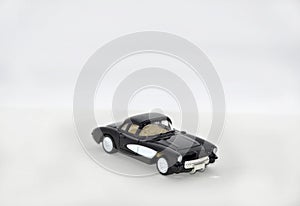 Toy car on a white background. buying, selling, insuring and renting cars