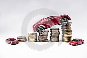 Toy cars with gold coins show To growth, saving money for car loans