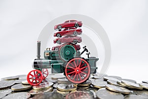 Toy cars with gold coins show To growth, saving money for car loans