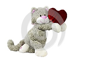 Toy cat gives heart. Valentine`s day