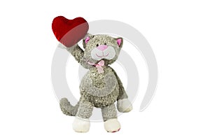 Toy cat holding a heart .Valentine`s Day