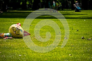 Toy cat on a summer lawn