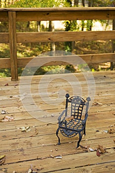 Toy chair on a deck