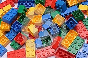 A toy construction set with many colorful building pieces