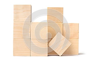 Toy constructor made of wooden blocks of cubic shape. Isolate on a white background
