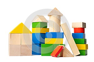 Toy constructor made of wooden blocks of different colors and shapes. Isolate on a white background