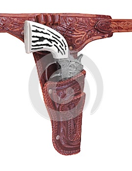 Toy cowboy pistol in holster isolated. photo