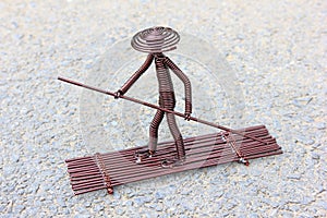 Toy crafts boatman made of copper wire