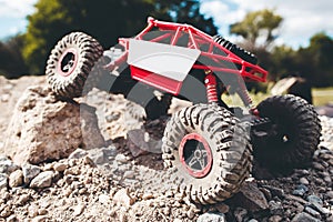 Toy crawler overcoming rock close-up