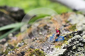 Toy cyclist ecotourism concept