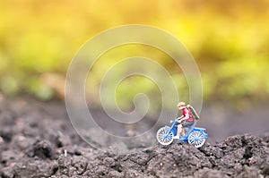 Toy cyclist ecotourism concept